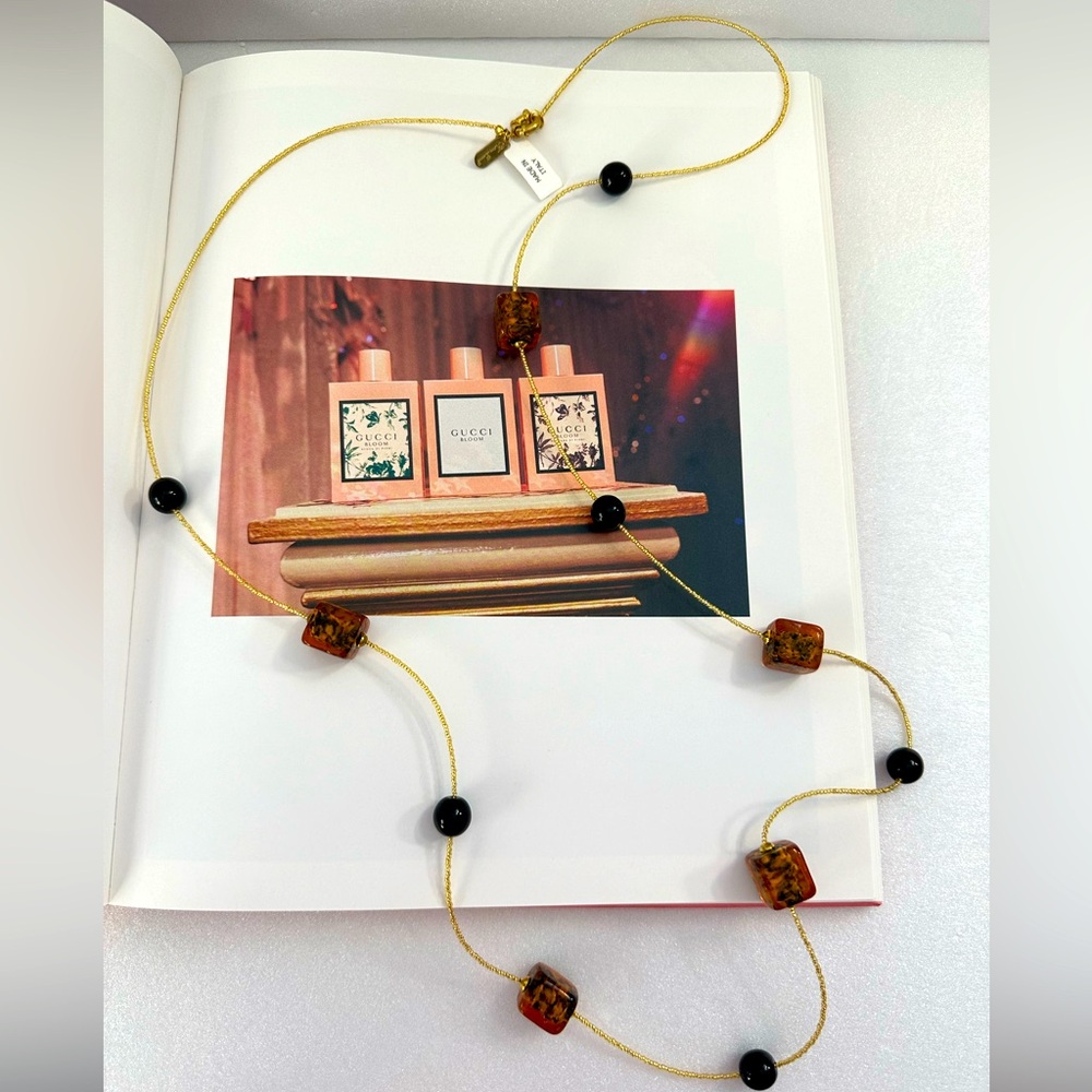 HILARY LONDON Glass bead gold tone long necklace amber NWT